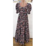 Biba maxi dress with puff sleeves in browns, blacks and oranges, a tiered skirt, scoop neck,