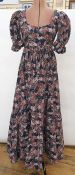 Biba maxi dress with puff sleeves in browns, blacks and oranges, a tiered skirt, scoop neck,