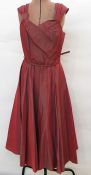 Various vintage dresses including 1950's rust-coloured satin cocktail dress with belt, a black lace,