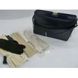 Ackery navy leather handbag, two pairs Cornelia James lady's gloves, pair of lady's cream leather