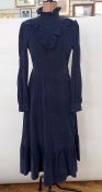 Blue corduroy 1970's dress labelled 'Doreen Junyer(?)' with piecrust collar, frilled bib to the