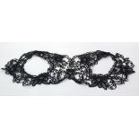 Victorian black lace trimmings off a jacket/cloak or a bolero-style jacket