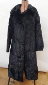 Black coney full-length vintage coat, a vintage squirrel cape labelled 'Laing & Prentice' and a