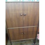 A. Younger Limited, mid 20th century teak cabinet, top section with two glass shelves, shelving to