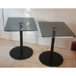 Pair Contemporary smoked glass and metal pedestal occasional tables, the rectangular tops with