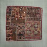 Indian embroidered and mica panel backed onto a silk covered board, 30cm x 30cm approx