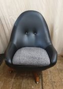 Mid-20th century Greaves & Thomas black leatherette egg shaped button back swivel chair