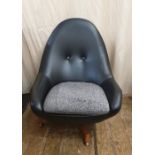 Mid-20th century Greaves & Thomas black leatherette egg shaped button back swivel chair