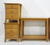 Pair of 20th century oak bedside chests of three drawers and a two-tier hall table (3)