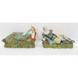 Pair 19th century pearlware pottery reclining figu