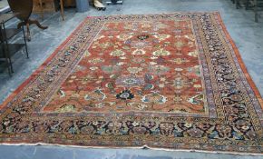 Eastern red ground rug with allover foliate decora