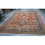 Eastern red ground rug with allover foliate decora