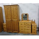 20th century pine two-door wardrobe, a chest of drawers, two bedside cabinets, two headboards and