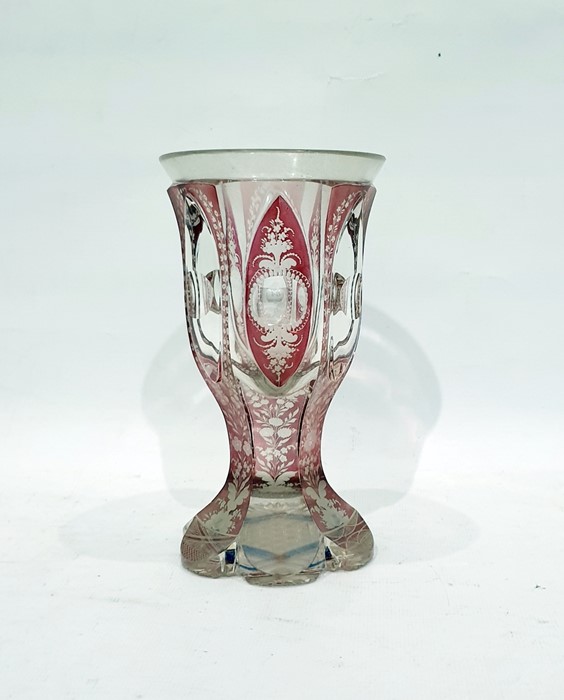 Bohemian-style ruby flashed cut glass goblet-shaped vase, hexagonal and on petal-shaped foot, 16.5cm