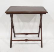 Folding butler's type table with detachable leather-topped tray and folding frame