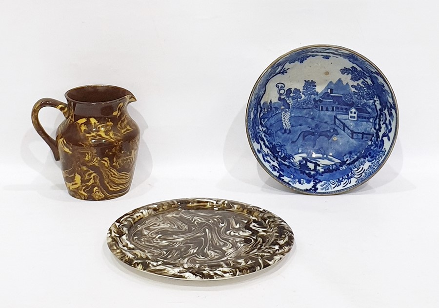 Macintyre marbled pottery circular cheese stand, similar jug and a blue and white bowl (3)