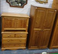 20th century pine two-door wardrobe, a blanket box and a chest of two short over two long drawers (