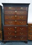 Late Georgian mahogany chest on chest, with dentil cornice, blind fretwork frieze to top and