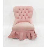 Modern bedroom chair in pink buttonback upholstery