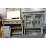 Pine and painted dresser with ogee moulded pediment above the doors enclosing shelves, a base of two