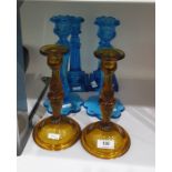 Pair of turquoise pressed glass table candlesticks with petal bases, another pair with lemon