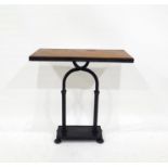 Cast metal and leather-topped occasional table, rectangular, on round arch support, rectangular base