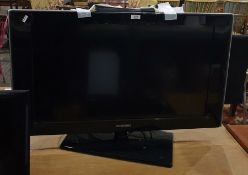 Samsung flatscreen television, 31" with remote control