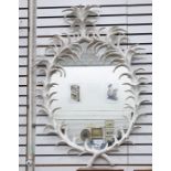 Oval wall mirror in a white painted naturalistic leaf frame