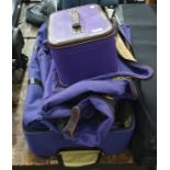 Purple canvas and leather travelling vanity case marked T. Anthony Limited with matching suit