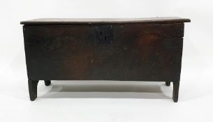 18th century oak six-plank chest, the rectangular top with carved edge decoration, iron ring hinges