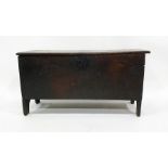 18th century oak six-plank chest, the rectangular top with carved edge decoration, iron ring hinges