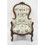 Victorian mahogany scoop back armchair, the cresting with fruiting vine, button upholstered and