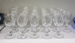 Set of 23 Baccarat wine goblets each with bell-shaped bowl and on baluster stem in two sizes