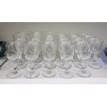 Set of 23 Baccarat wine goblets each with bell-shaped bowl and on baluster stem in two sizes