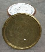 Brass tray table with Islamic motifs and writing, a folding stand and a circular needlework