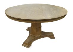 Birch circular centre table of Victorian style, the circular top with crossband border and on