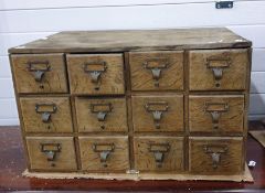 Early 20th century oak chest of 12 short drawers,