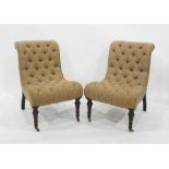 Pair Victorian button upholstered scroll back easy armless chairs on front turned tapering stump