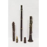 Stained wood flute and a clarinet