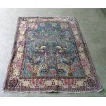 Blue ground Persian rug with Tree of Life decorati