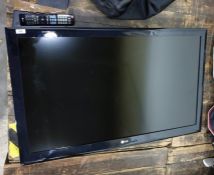 LG flatscreen wall-mounting television, 42" with r