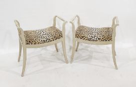 Pair of painted wood revived Regency pattern dressing stools, each having simulated leopardskin