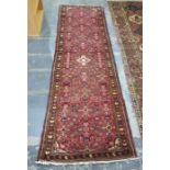 Pink ground Persian runner, the field with floral