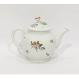 18th century porcelain bullet-shaped teapot, naturalistically floral spray painted, the cover with