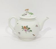 18th century porcelain bullet-shaped teapot, naturalistically floral spray painted, the cover with