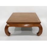 Modern Eastern hardwood square-top coffee table on shaped supports, 102cm x 45cm