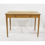 Oak side table, rectangular and having single frieze drawer, on circular tapering supports