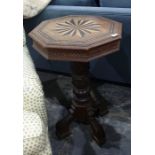 19th century oak and inlaid octagonal centre table with moulded edge above Greek key moulded