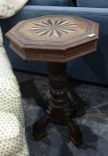 19th century oak and inlaid octagonal centre table with moulded edge above Greek key moulded