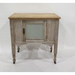 19th century pot cupboard with pine top and painted base with bead moulding, on turned supports to